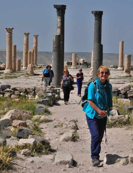 women walking in ancient ruins on a sunny day