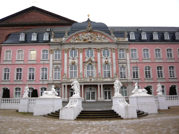 an old building that is red in color