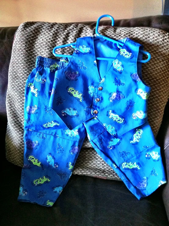 two pairs of baby blue pants with fish print