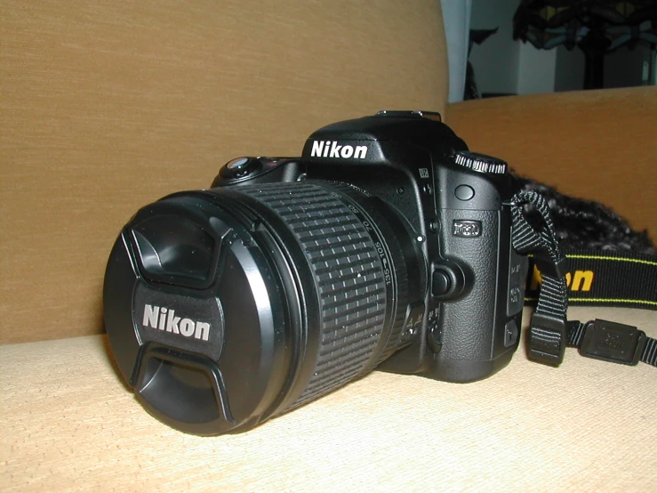 a camera sitting on top of a couch