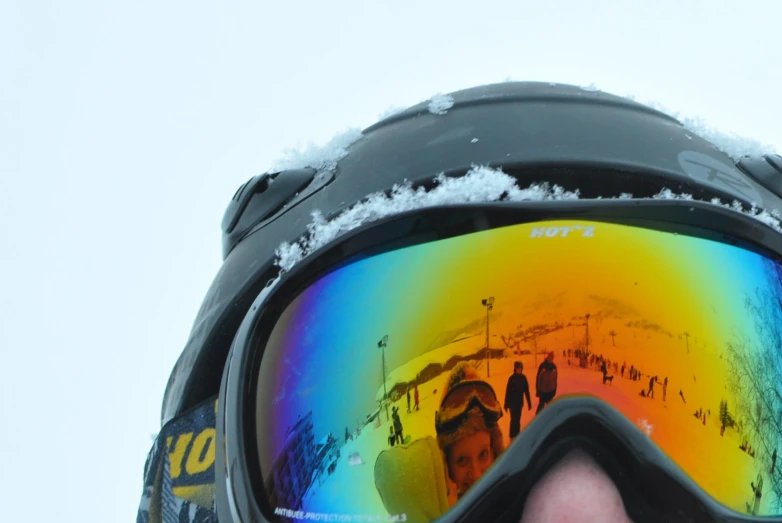 an eye view of snow covered goggles on the side of a building