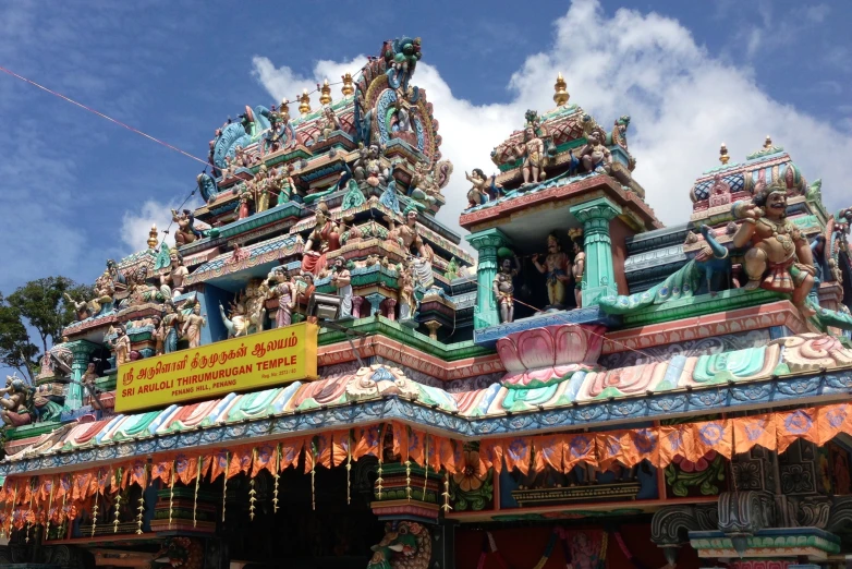 an elaborately decorated hindu building is shown