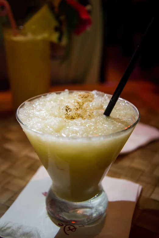 an alcoholic drink with lime and spices