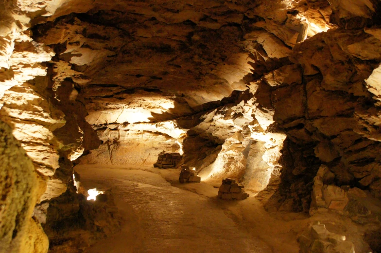 a very narrow room that has some big rocks