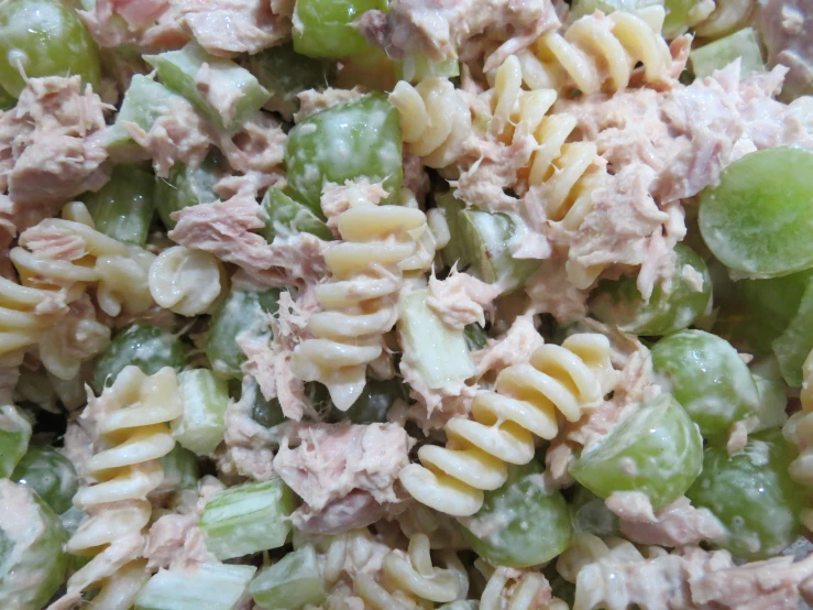 close up of the pasta salad with meat and peas