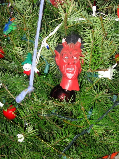 there is a red devil in the tree