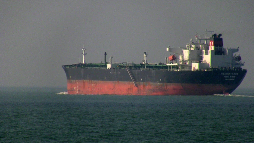 an enormous cargo ship in the water