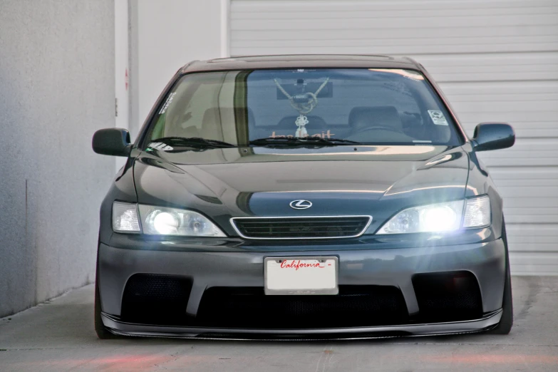 a car that is parked in front of a garage door