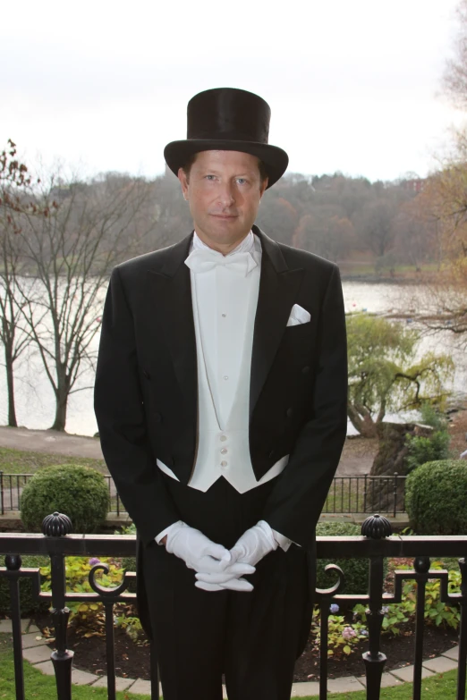 a man with a top hat and bow tie