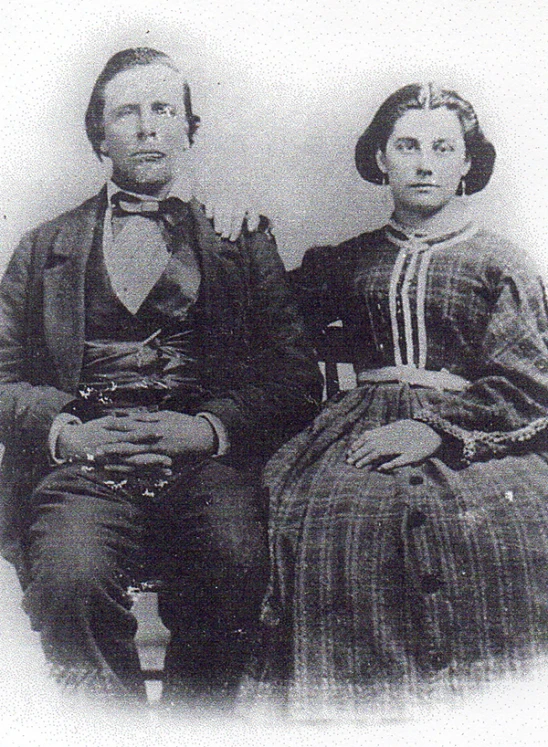 a man and woman posing for a po