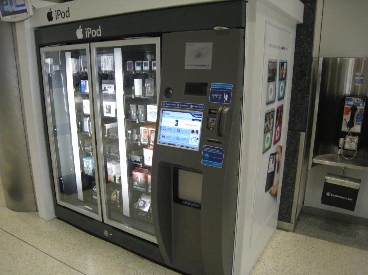 a vending machine that is inside of an airport