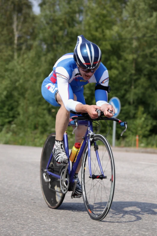 a young man on a bicycle is attempting to ride