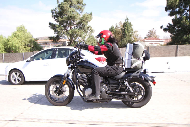 a man is sitting on a motorcycle