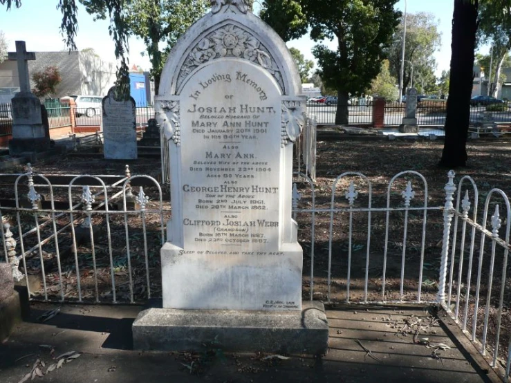 a cemetery that has the headstone of several people