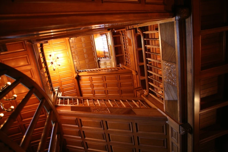 a stair case in an enclosed room in a building