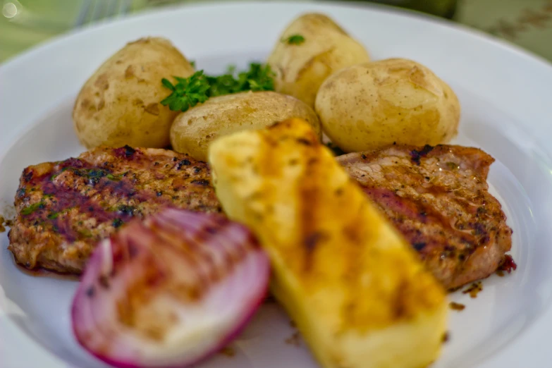 a plate has various food items on it