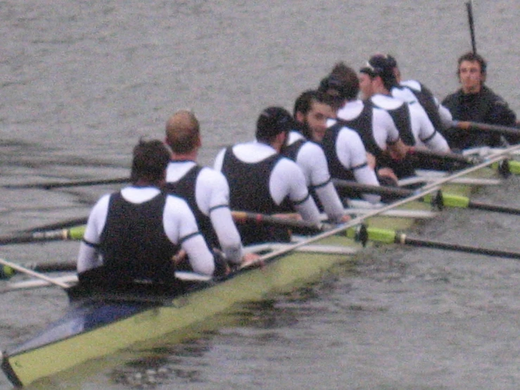 a group of people riding on top of a boat