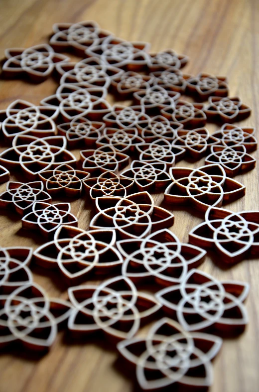 chocolate hearts with circles cut out on a table