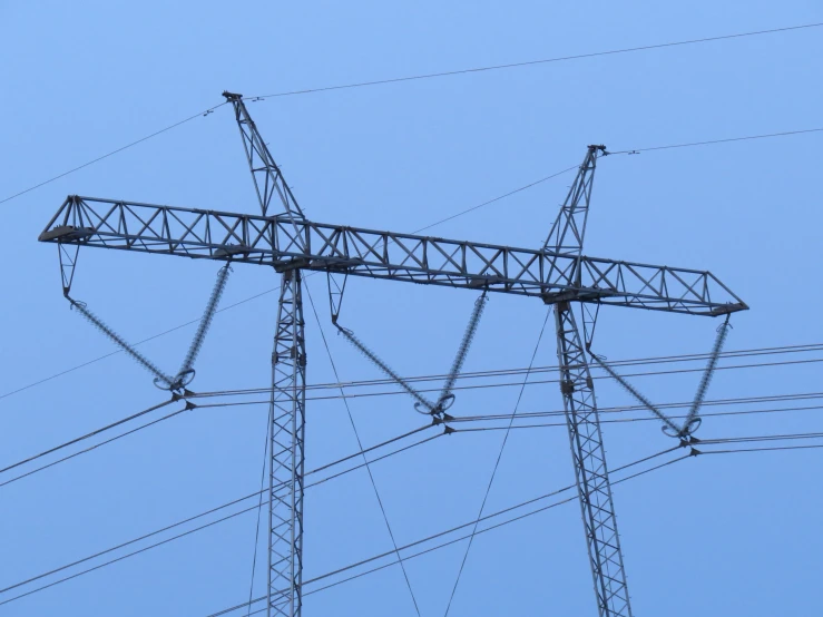 high power line on the right side of a big blue sky