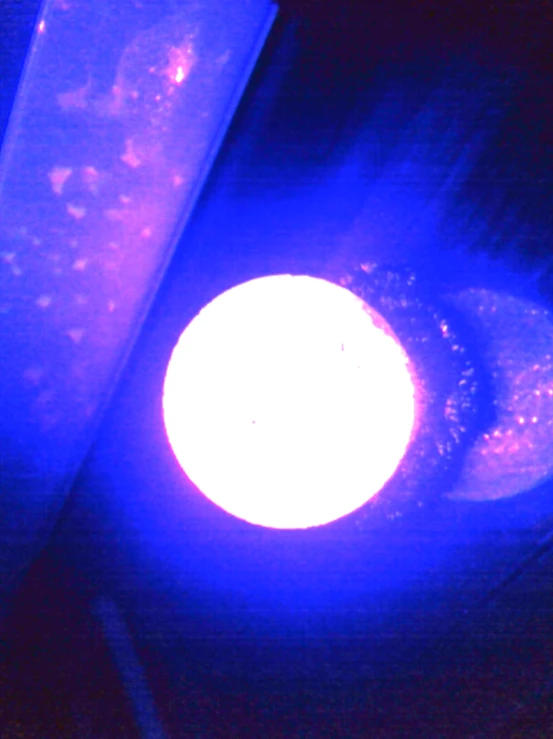 the light shines on the base of a blue object