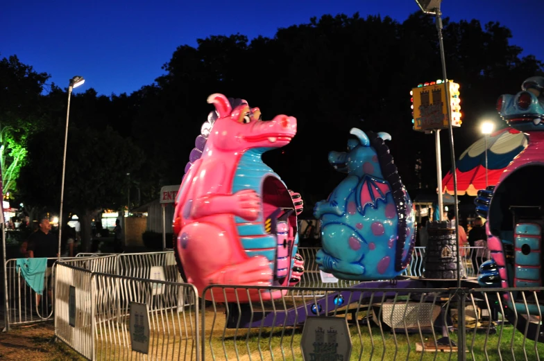 an amut park with large inflatable animals