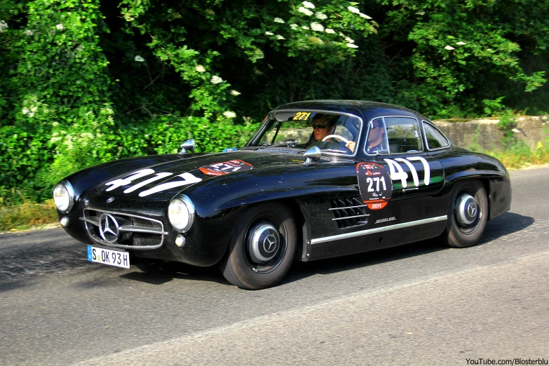 a classic car has some numbers on the front of it