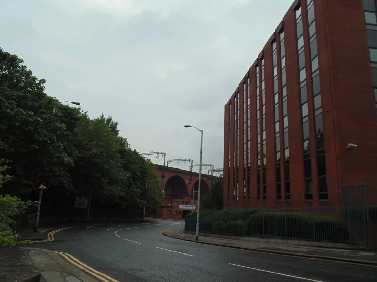 the street has a very long, narrow tunnel between buildings