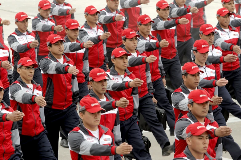 the marching team is in full color red and grey