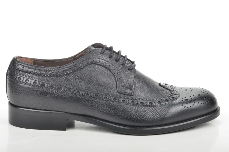 a black leather brollard dress shoe