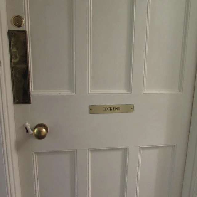 a close up of the door with signs on it