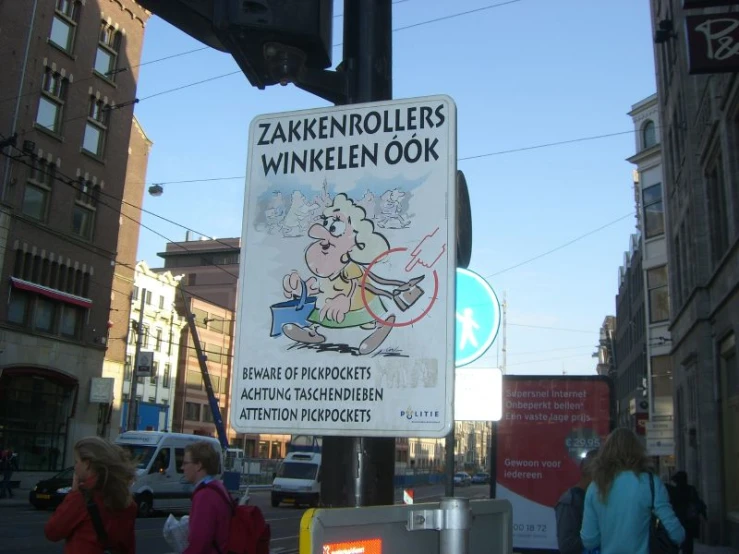 the sign for some kind of funny cartoon on a city street