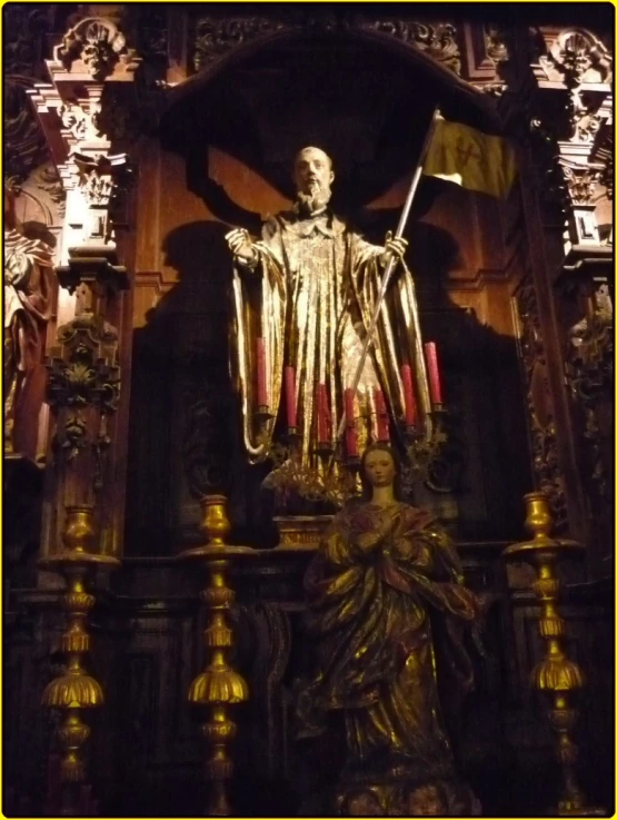 a statue of the patron stands at the altar