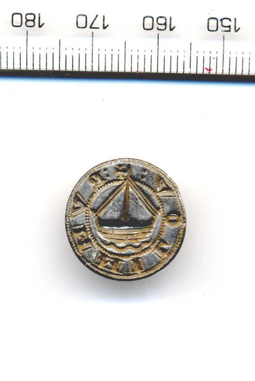 a pin that has been used as a ruler