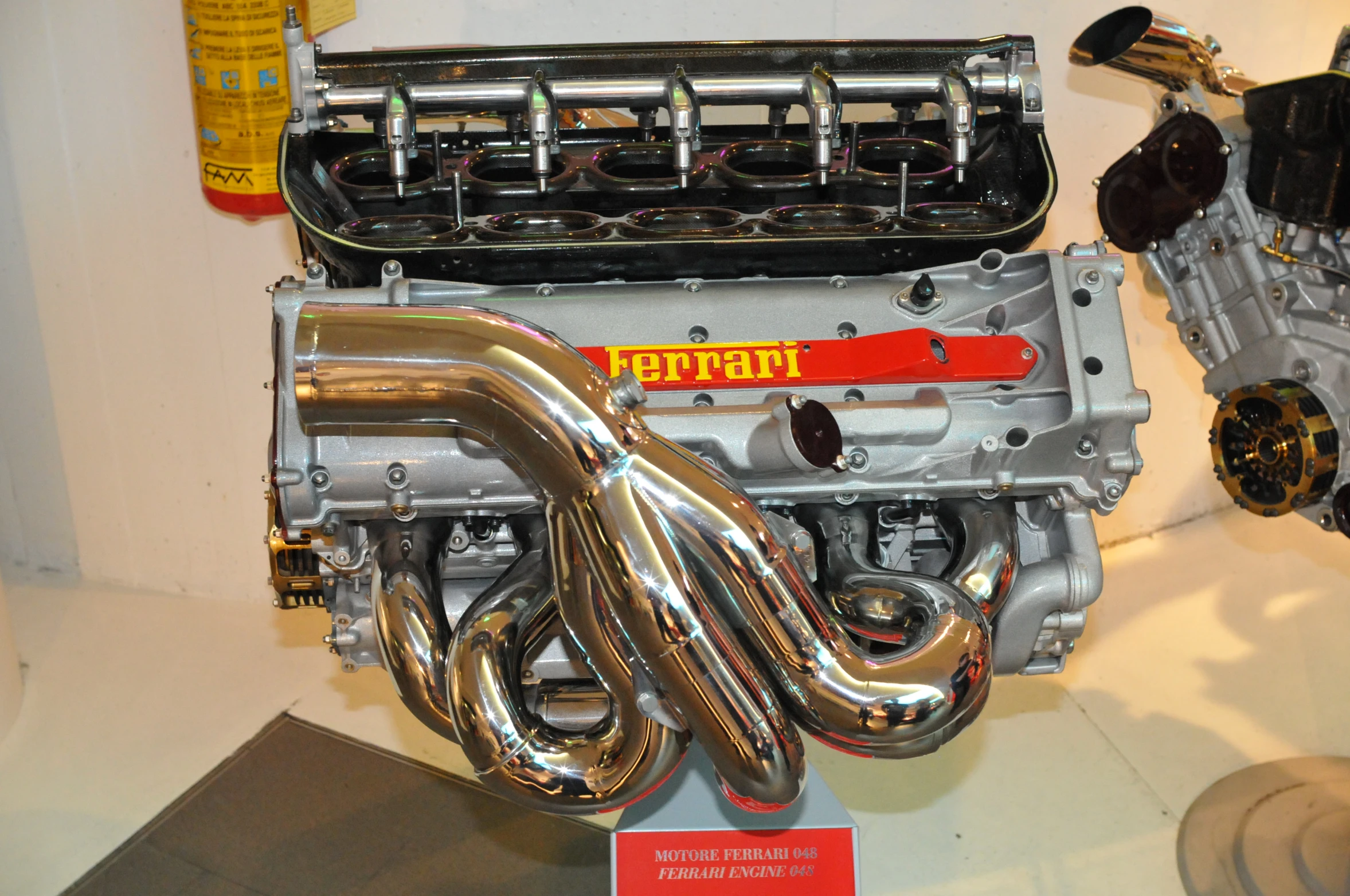 an engine of some sort is displayed on the wall