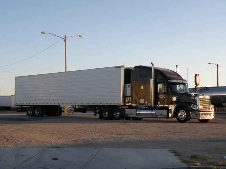 a large truck parked on the side of a road