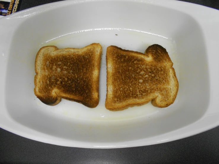 toasted bread with brown sugar sitting in a white bowl