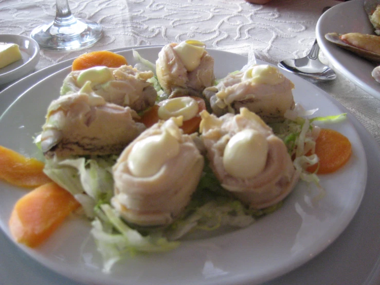 a plate of food sitting on top of a table