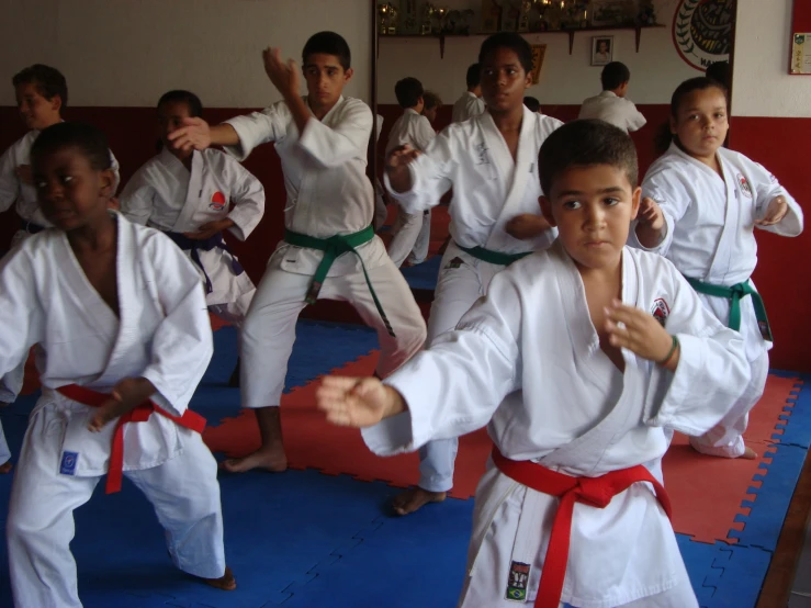 group of s in kimonos at karate class