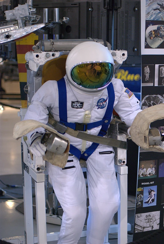 a man is dressed up in astronaut suit