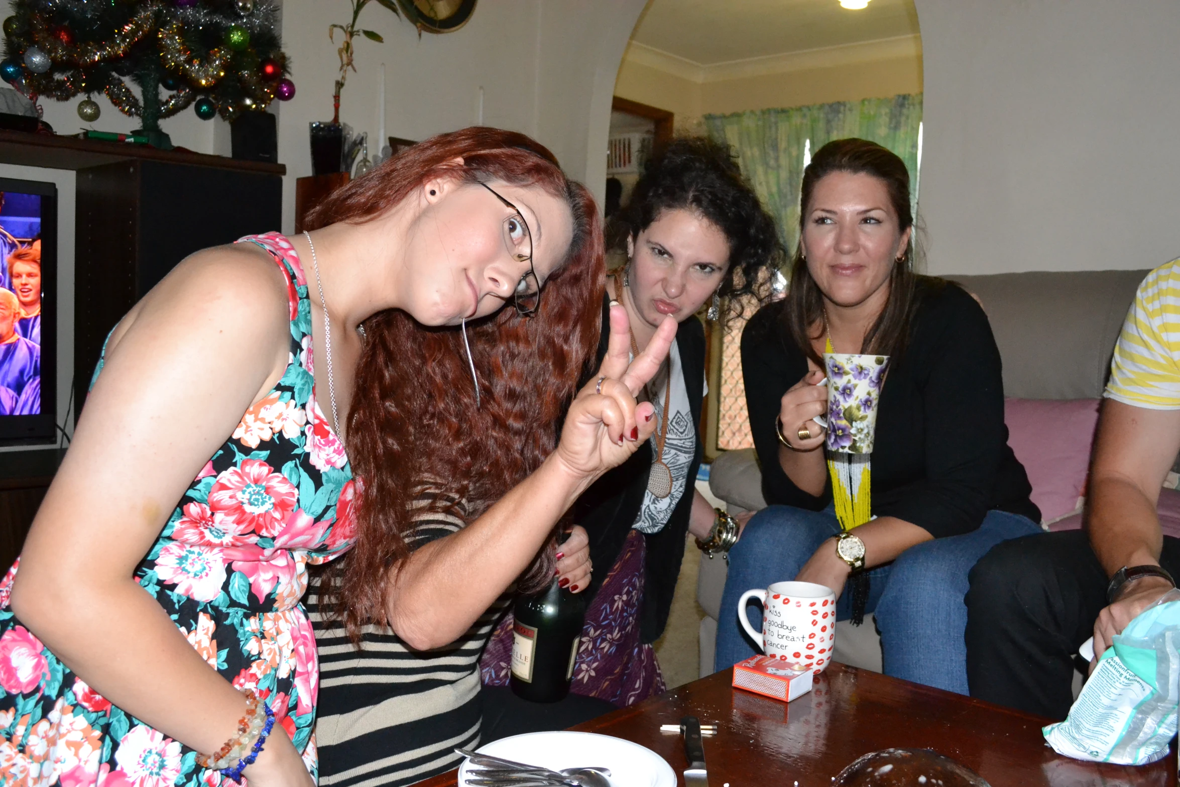 a group of people are enjoying drinking tea together