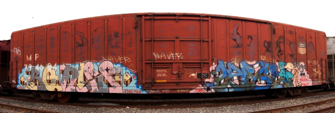 train graffiti is on the side of the train