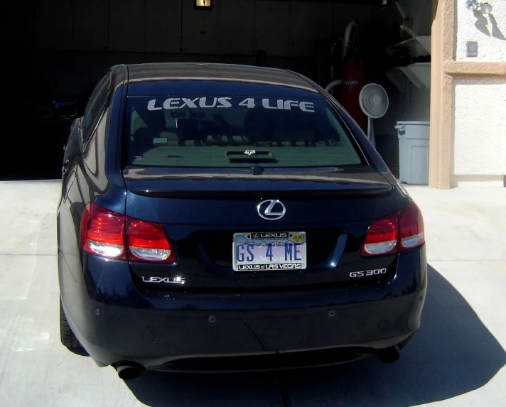 a back view of the trunk of a vehicle that is parked inside of a garage