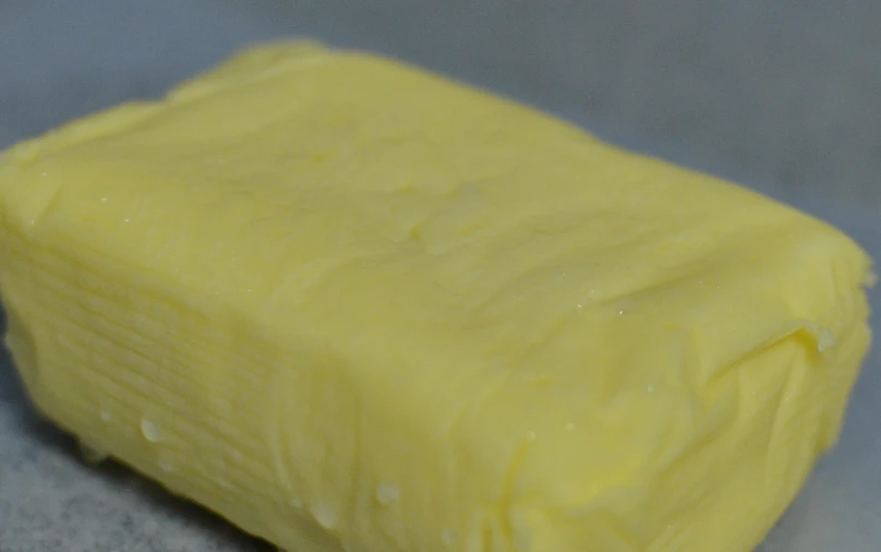 a yellow block of er sitting on a counter