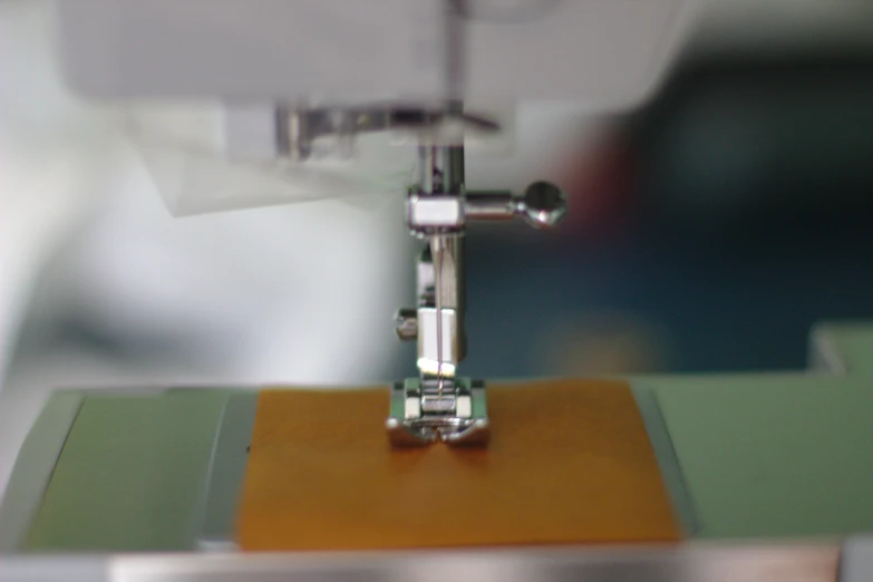 there is an embroidery machine that operates the needle
