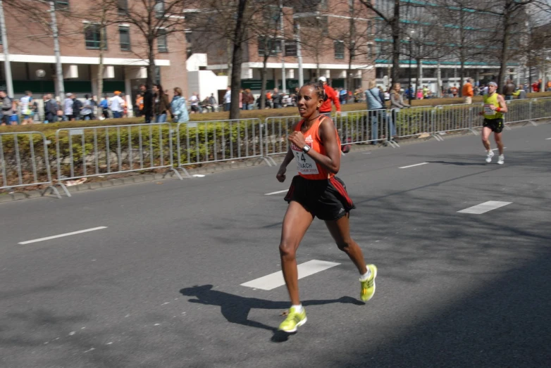 a marathon runner is running in the streets