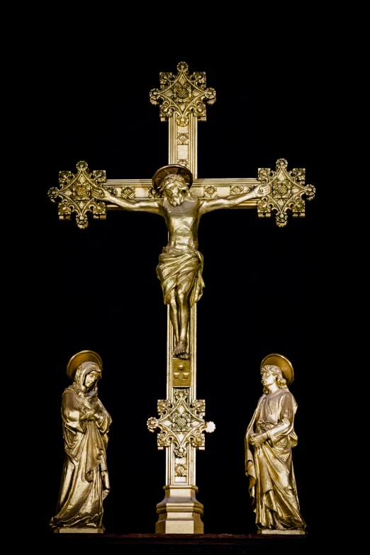 an image of a statue of jesus and mary on a crucifix