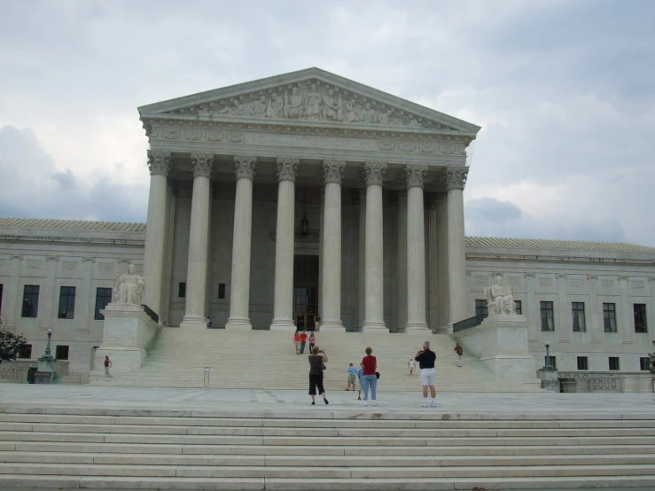 people are in front of the supreme building