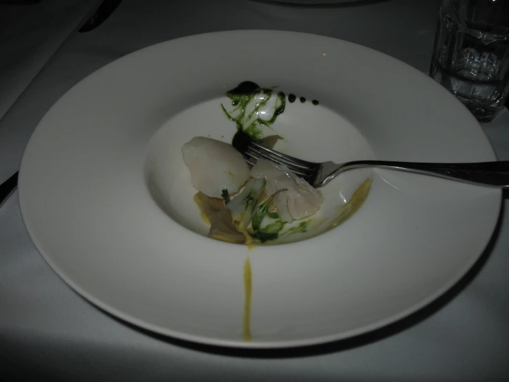 a plate with some food on it sitting on a table