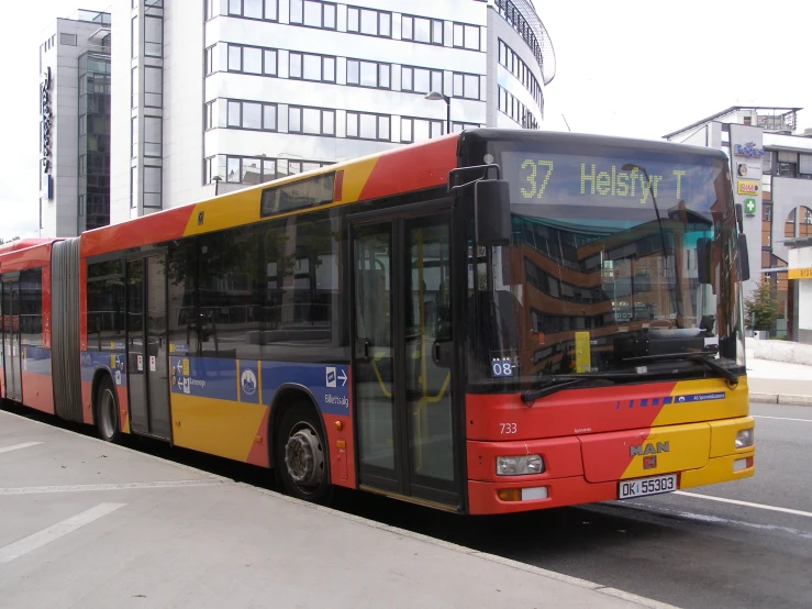 a bus driving on the side of a street