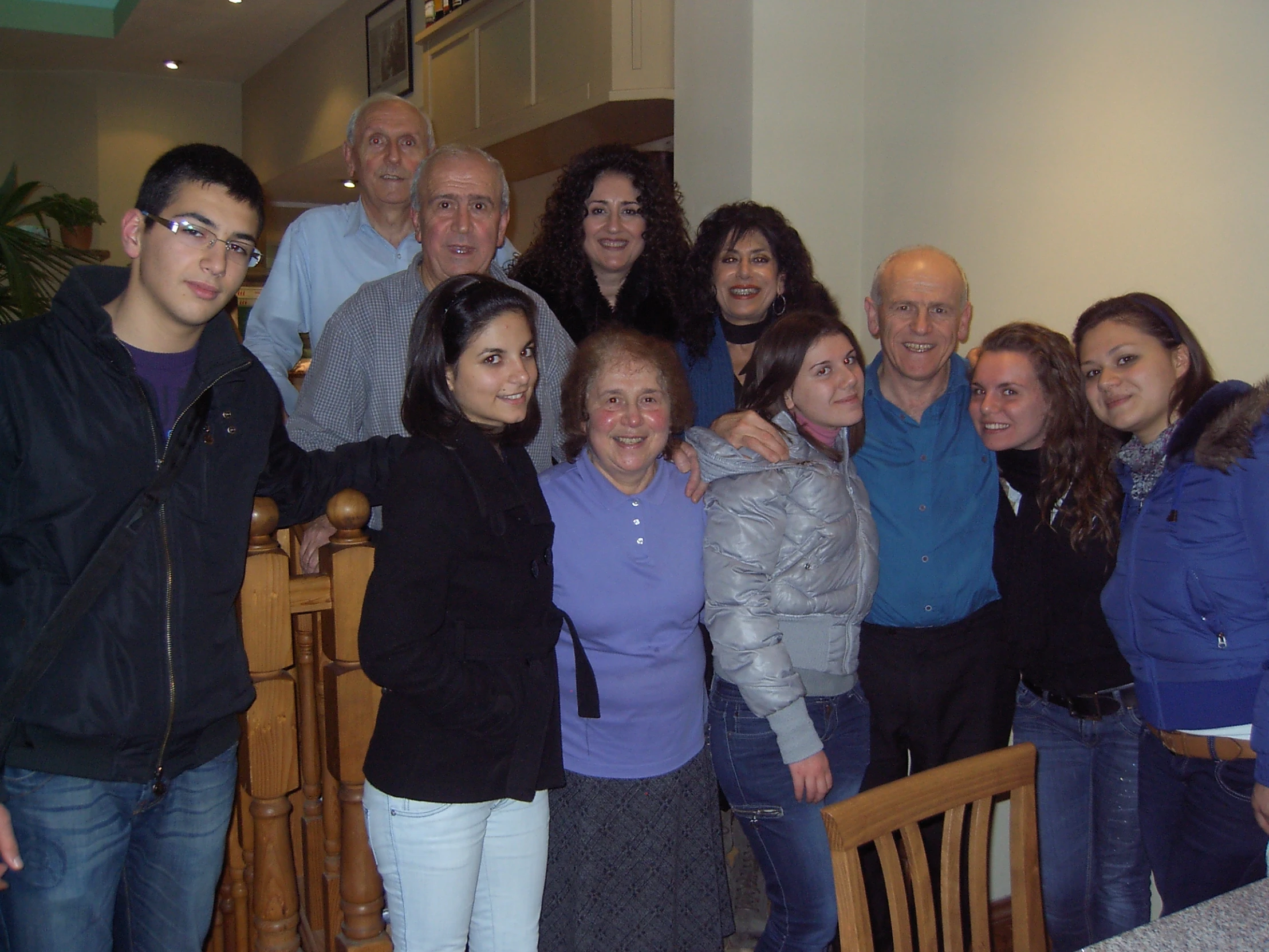 group of people posing for po with adult friends